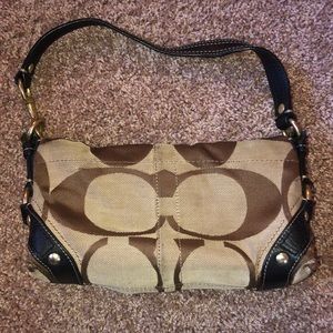 Small (authentic) slightly worn Coach purse.